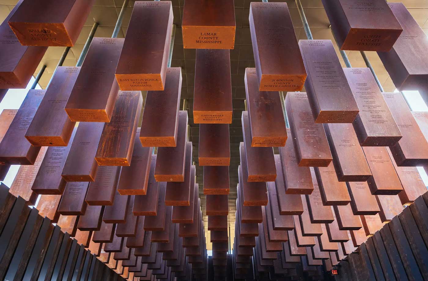 The National Memorial for Peace and Justice, shot from below steel columns.